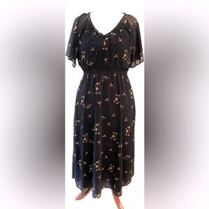 Madewell midi dress. Black with small floral print. Size large.